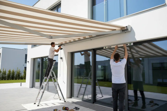 Professional technician installing premium aluminum retractable awning on modern building - step-by-step installation guide for commercial and residential outdoor shading solutions